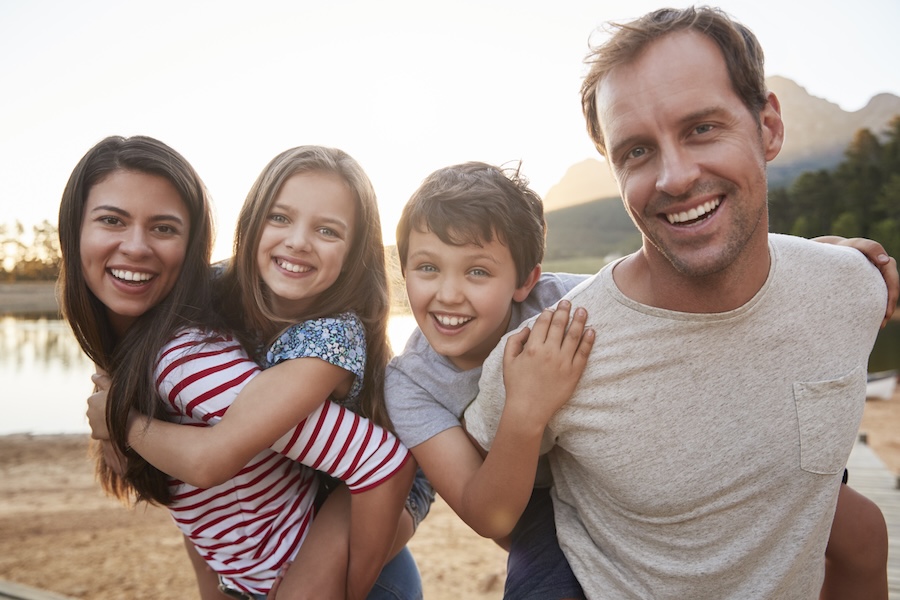 family smiling before heading to a family dentist in Shoreline, WA