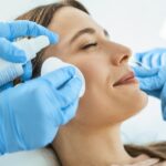 woman getting botox for TMJ at the dentist